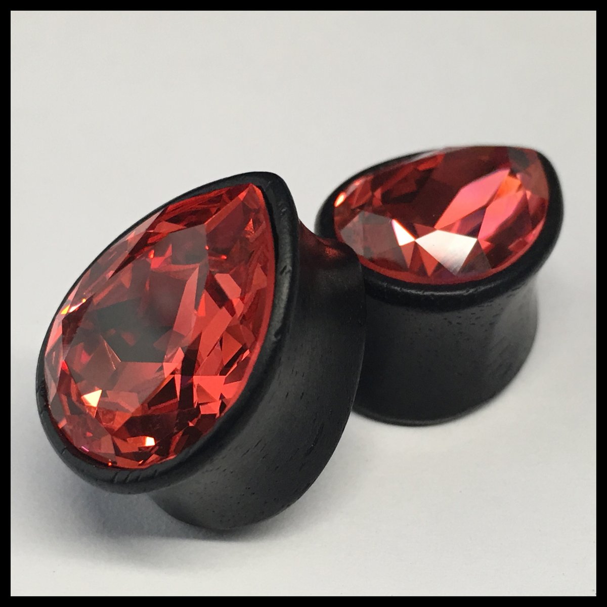 Ebony Med Swarovski Padparadscha Teardrop Plugs