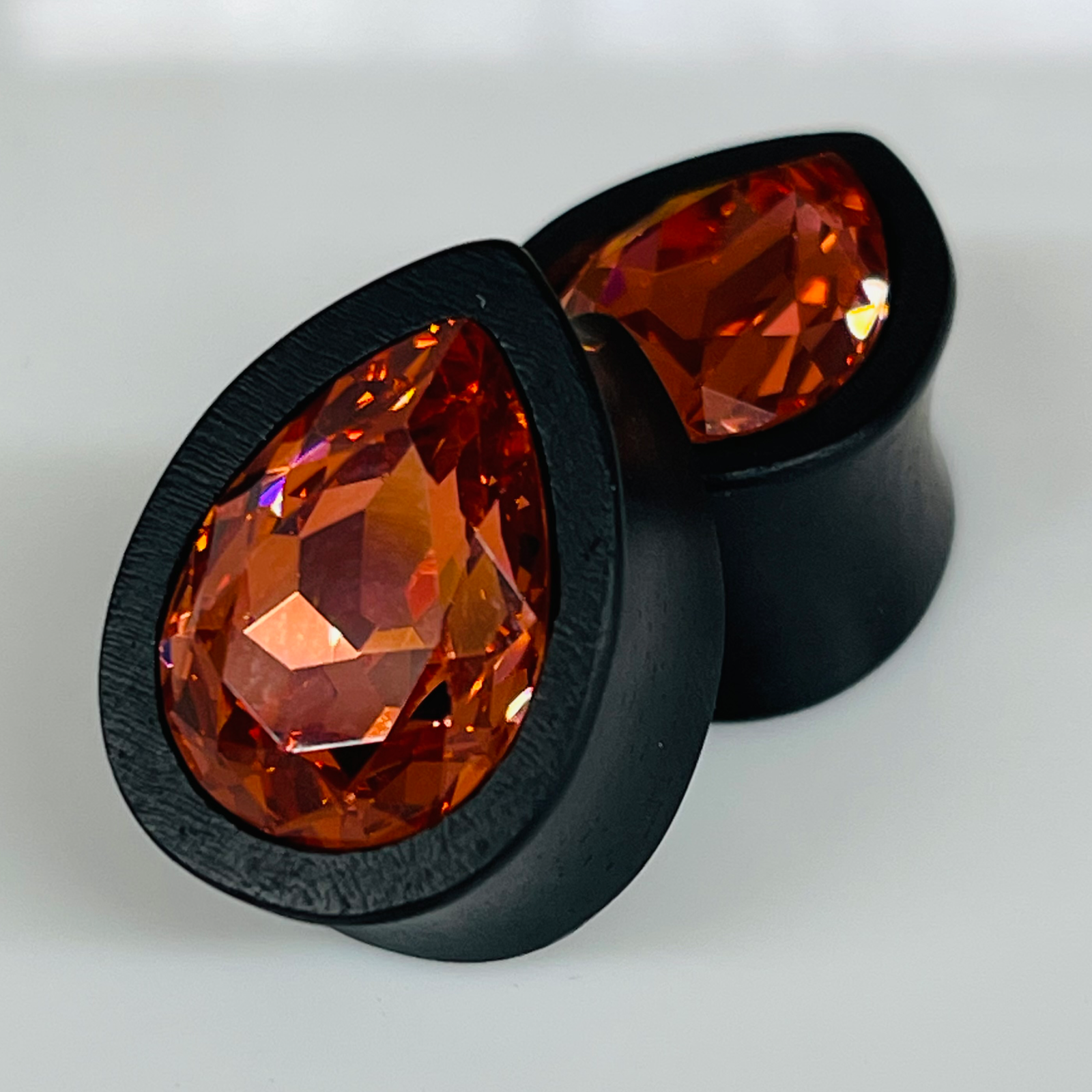 Ebony Med Swarovski Padparadscha Teardrop Plugs