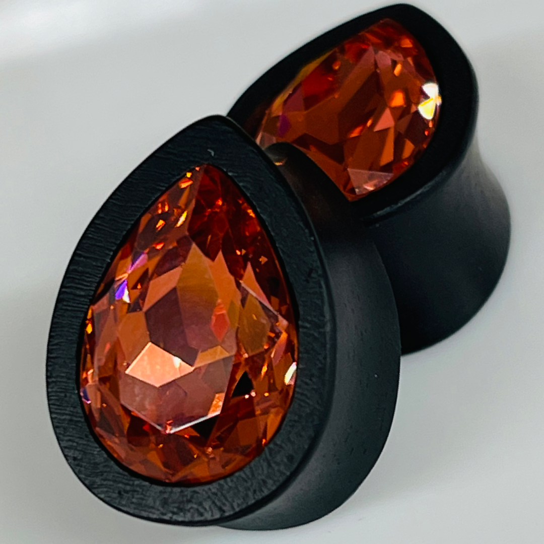 Ebony Small Swarovski Padparadscha Teardrop Plugs