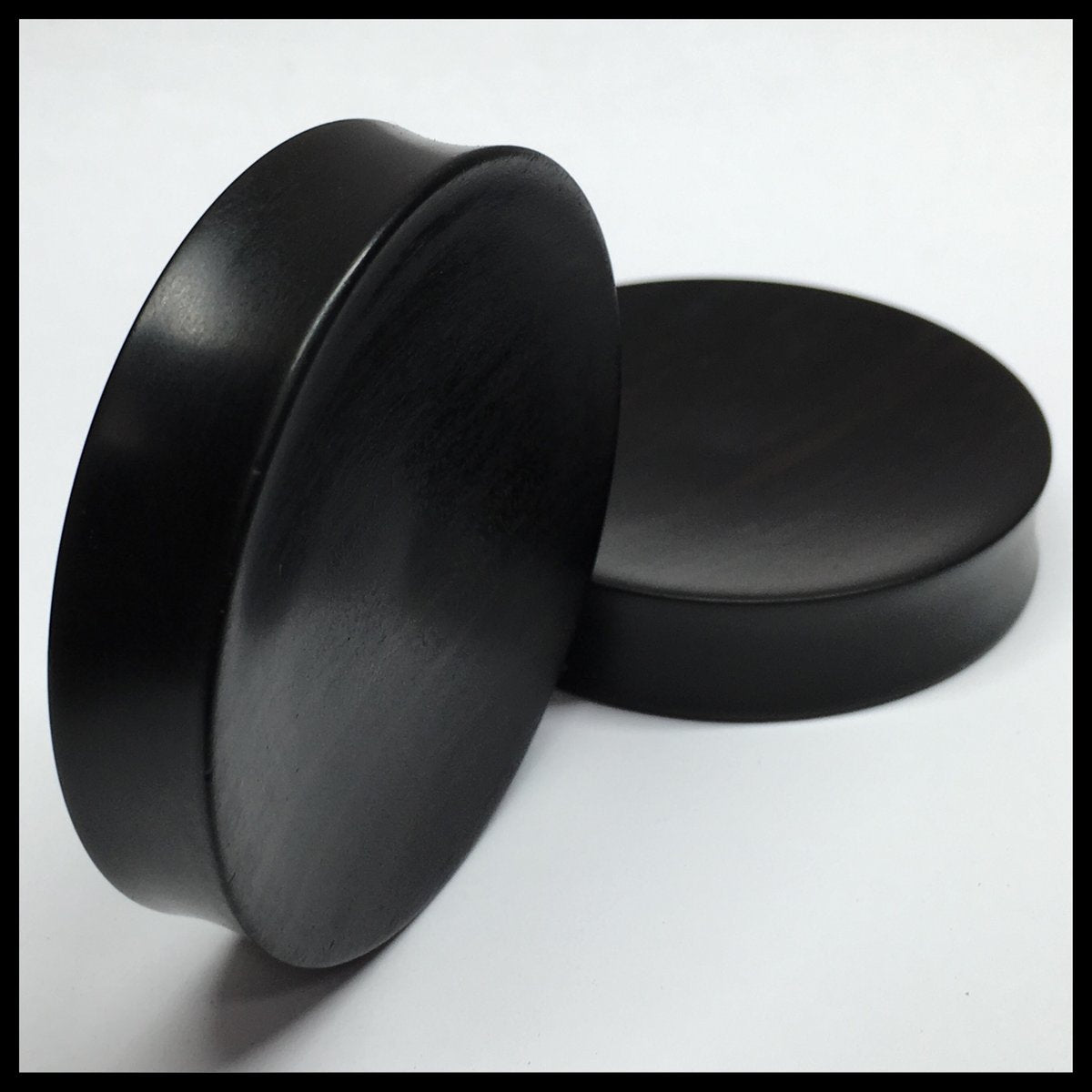 Ebony Concave Round Plugs
